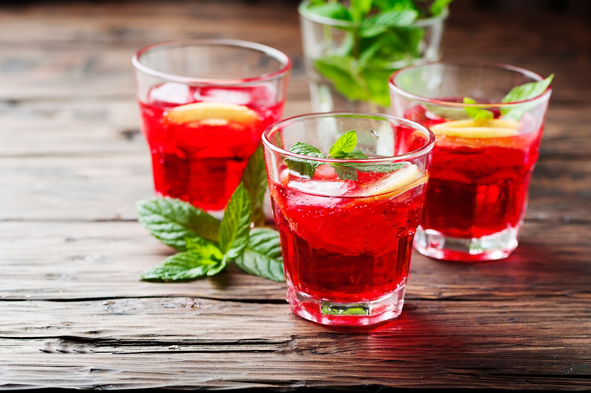 Aperitif with campari, mint and lemon